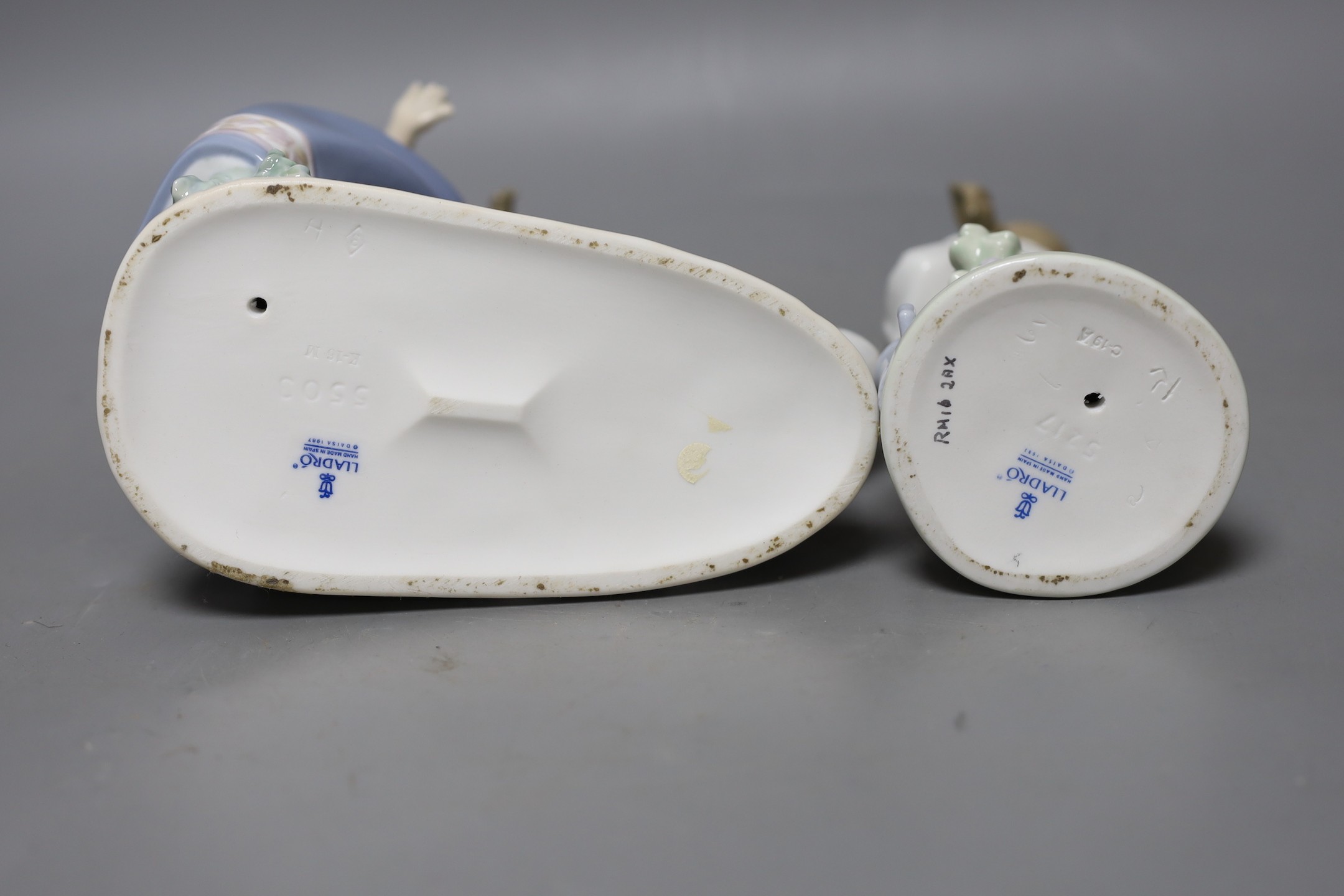 A boxed Lladro figure and another